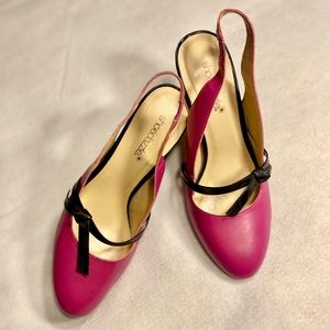 Pink sling back 3 inch heels with black bow
